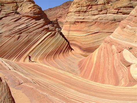 Hiker in the Wave, Vermilion Cliffs National Monument, Arizona : hiking