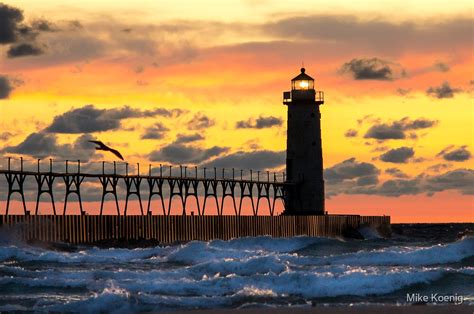 "Manistee Michigan Lighthouse at Sunset" by Mike Koenig | Redbubble