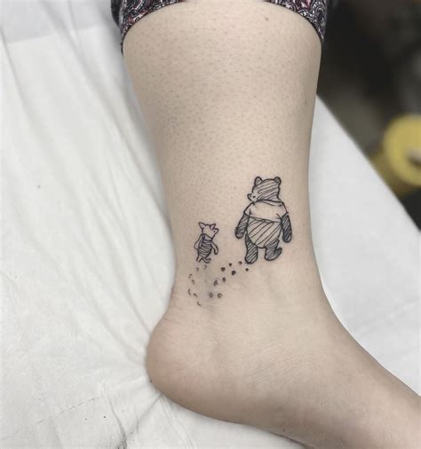 UPDATED: 40 Uplifting Winnie the Pooh Tattoos (November 2020)