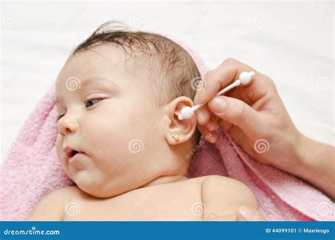 Cleaning Baby Ear Stock Photo - Image: 44099101