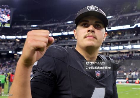 Quarterback Aidan O'Connell of the Las Vegas Raiders gestures as he ...