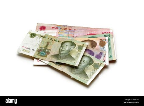 Chinese Yuan banknotes in various denominations on a white background ...