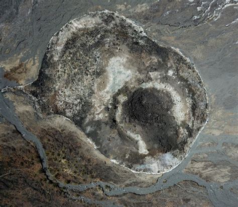 A descent to hellish depths: inside the crater of Mount Tambora