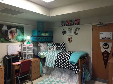 FSU dorm room. Shelving unit from Bed Bath and Beyond provides a place ...