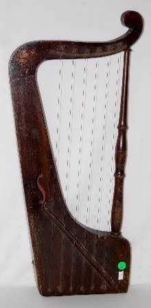 104B: 6 String Hand Held Harp Like Instrument