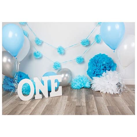 blue and silver decorations with one sign on the floor in front of ...