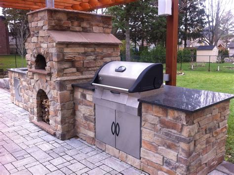 A pizza oven is a fun addition to an outdoor kitchen! | Outdoor pizza ...