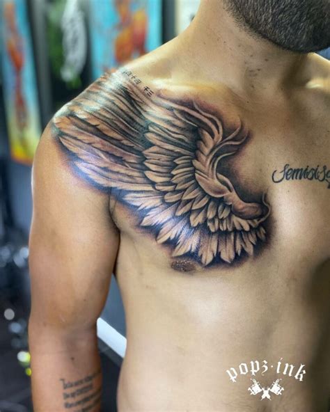 Aggregate 71+ angel wings chest tattoo super hot - vova.edu.vn