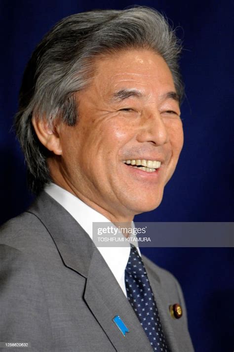 Japanese Foreign Minister Hirofumi Nakasone smiles at the end of his ...