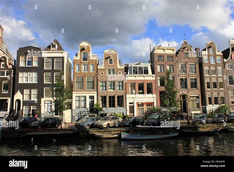 amsterdam canal houses Stock Photo - Alamy