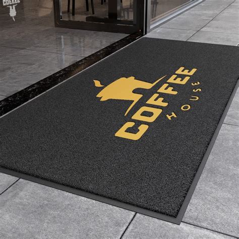 an entrance mat with the words coffee on it