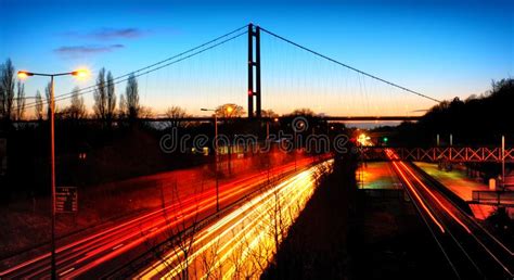 Road and Bridge at night stock photo. Image of sunset - 100113842