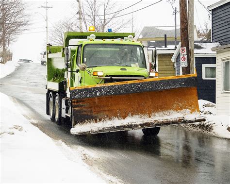 HD wallpaper: Snow plow truck salting roads before a snow storm ...