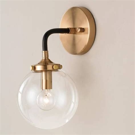 black bathroom sconce | Globe sconce, Sconces, Modern sconces