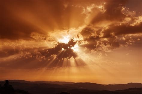 Premium Photo | Sky with clouds and sun rays. Sunset over mountains ...