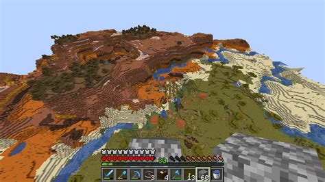 Found a giant Mesa biome with, a village near the intersection of 3 ...