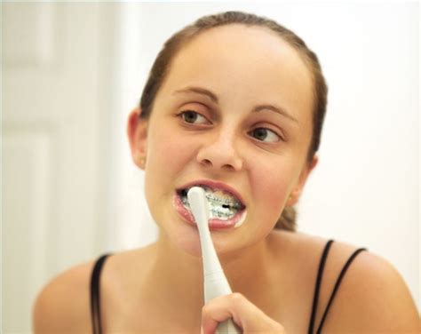 How to Brush Your Teeth While Wearing Braces | Teeth braces, Teeth, Braces