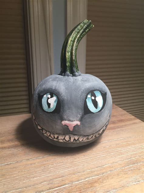 This is a DIY Cheshire Cat painted pumpkin, just creepy enough for ...