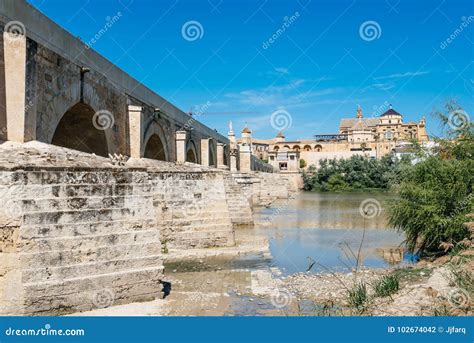 Roman Bridge Over Guadalquivir River Editorial Photography - Image of ...