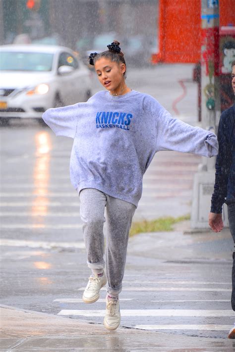 Practical Rainy-Day Outfits to Steal From Celebrities This Spring ...