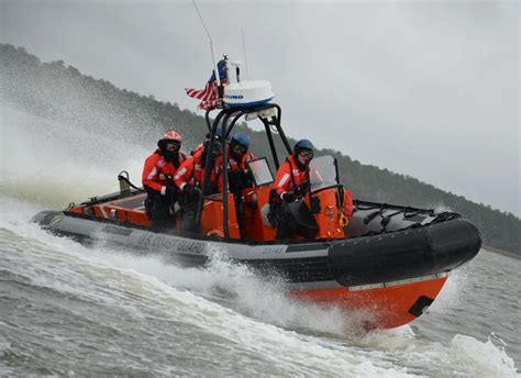 Coast Guard boat crew members practice tactics for stopping small boats ...