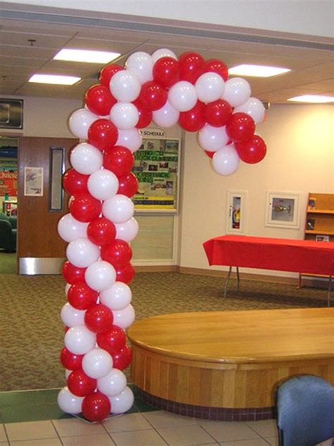 Candy Cane Balloon Column | Christmas balloon decorations, Balloon ...