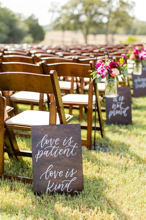 Rustic Wood Signs with Calligraphy as Aisle Decorations