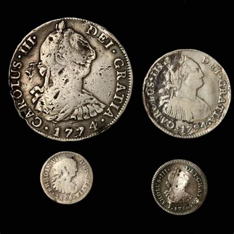 Four Spanish Colonial Milled Silver Coins (Lot 99 - Coins & CurrencyFeb ...