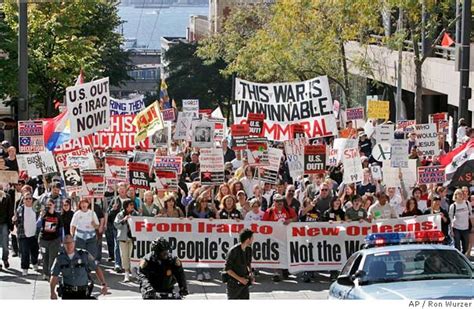 Thousands protest the Iraq war / SF also crowded with Loveparade revelers