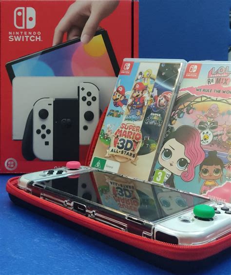 Nintendo Switch OLED (+ 2 Games) Good As New!, Video Gaming, Video Game ...