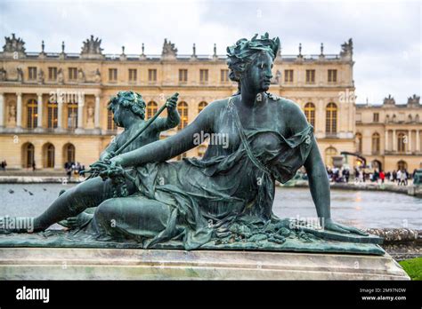 Versailles, France - Dec. 28 2022: The bronze statue in the garden of ...