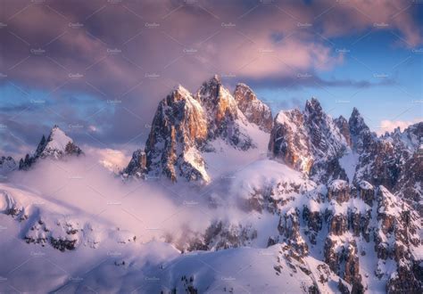 Snowy mountain peaks in fog | Snowy mountains, Snowy, Winter landscape