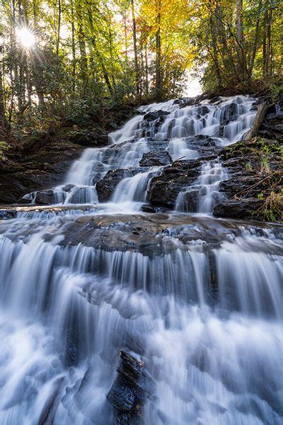 A walking trail around the Lake Trahlyta in Vogel State Park features ...