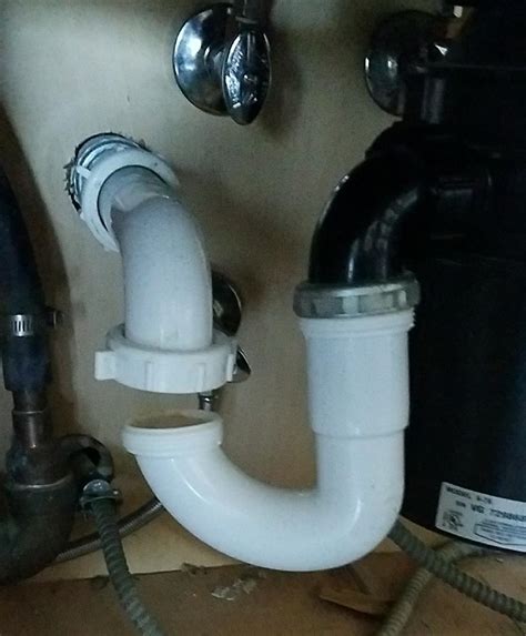 plumbing - New sink installation: garbage disposal sits lower and p ...