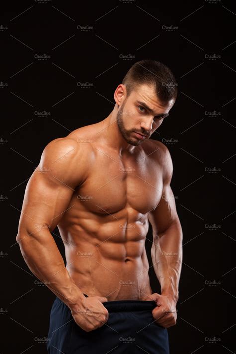 Strong Athletic Man - Fitness Model showing Torso with six pack abs ...