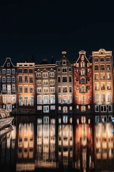 Dancing Houses Damrak Amsterdam during the Night Netherlands Holland ...