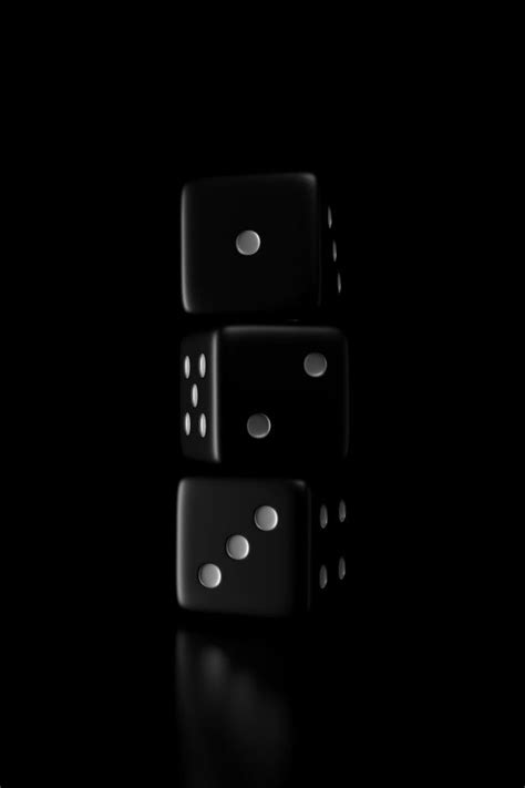 Premium Photo | Light and shadow of dice | Matte black background ...