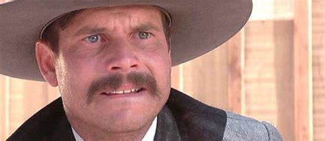 Bill Paxton as Morgan Earp, having just killed a man at the OK Corral ...