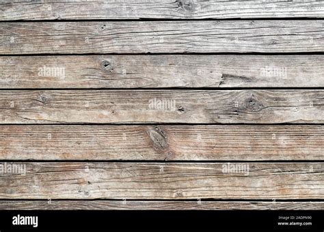 Horizontal wooden texture wall of rural house. Old dirty panels ...