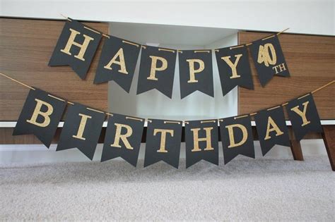 a happy birthday banner is hanging on the wall