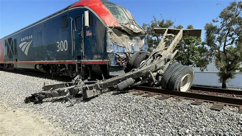 16 people are hospitalized after an Amtrak train crashes into a water ...