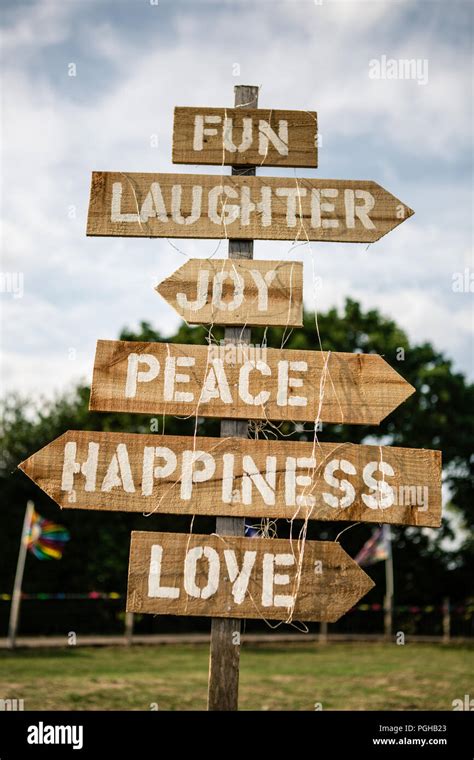 Wooden joy, peace, love and happiness sign at DIY garden wedding Stock ...