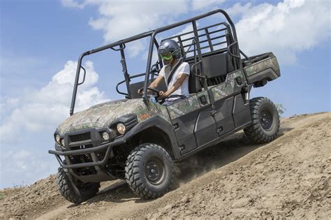 Kawasaki MULE PRO-FXT Camo Action Shot (11) - ATVConnection.com