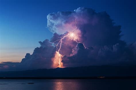 Isolated cumulonimbus cloud with positive lightning | Clouds, Lightning ...