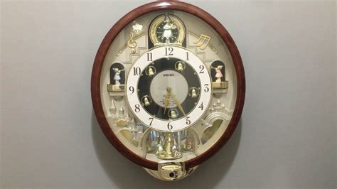 Seiko Charming Bell QXM109BRH Musical Wall Clock - YouTube