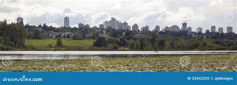 Burnaby BC City Skyline from Deer Lake Stock Photo - Image of ...