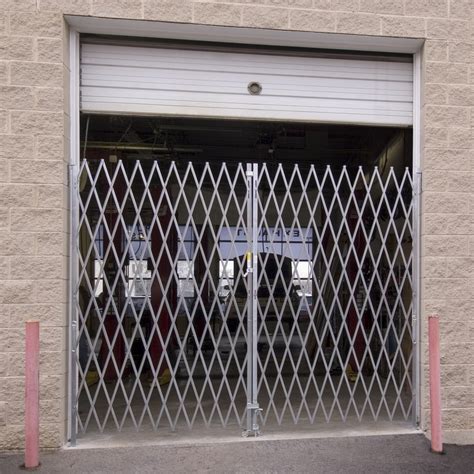 Heavy Duty Pair Folding Security Gates - Barron Equipment & Overhead Doors