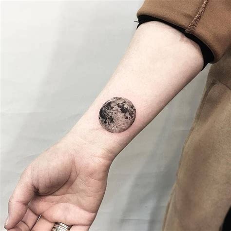 Moon tattoo on the right inner wrist. | Wrist tattoos for guys, Cool ...