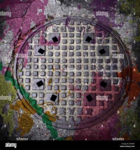 Sewer drain cover Stock Photo - Alamy