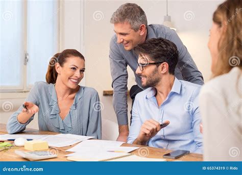 Happy business team stock image. Image of businessman - 65374319